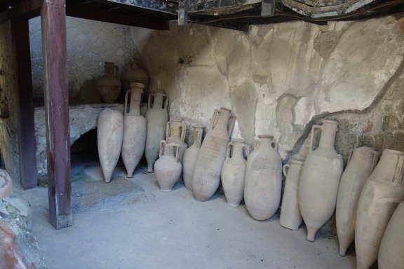 Original wine urns in a wine shop.