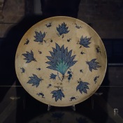 This plate, among many others, was found by underwater archeologists in a shipwreck from, I think, the 16th century. The plate is Turkish, or maybe I made that up.