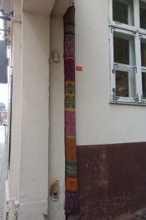 And quirky! Someone knit-bombed this down-pipe!